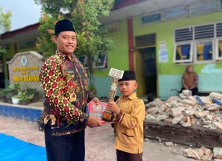 Membanggakan! Irsyad, Siswa Kelas 2A MIN 10 Asahan Raih Juara 3 MTQ Kabupaten Cabang Tartil Anak Putra